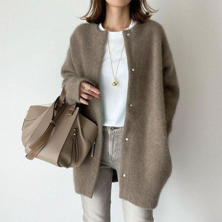 Classic women's elegant mid-length winter coat. Versatile long-sleeve outerwear for chic fall & winter fashion.