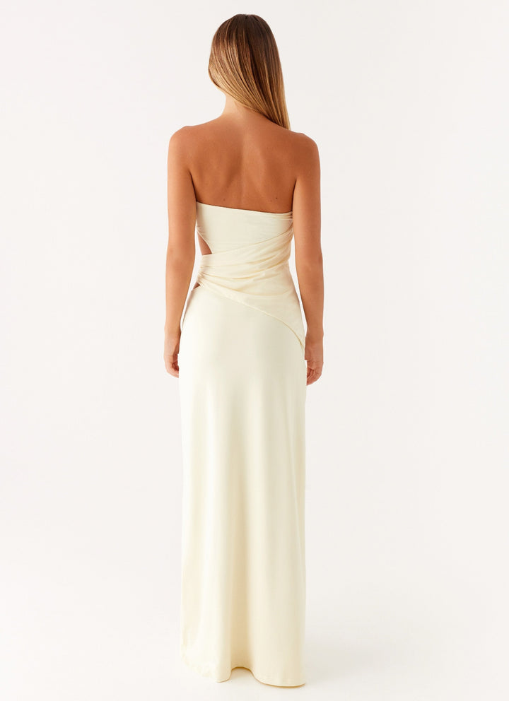 Stylish yellow strapless maxi dress featuring elegant ruched side embellishments, a must-have for women's fashion.