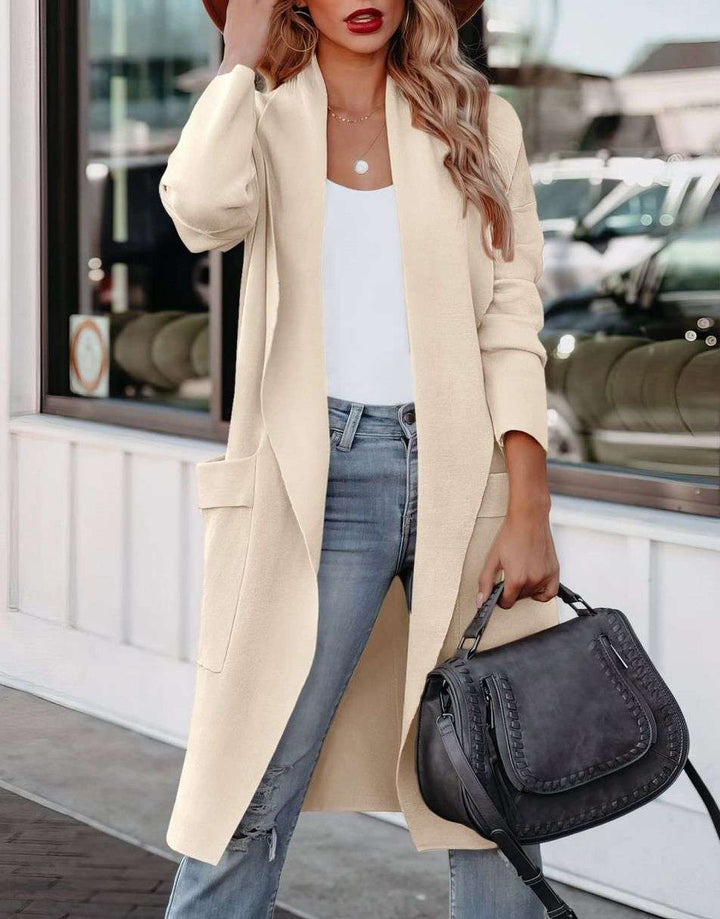 Stylish women's long open front cardigan in a relaxed fit, offering versatile and comfortable everyday fashion.
