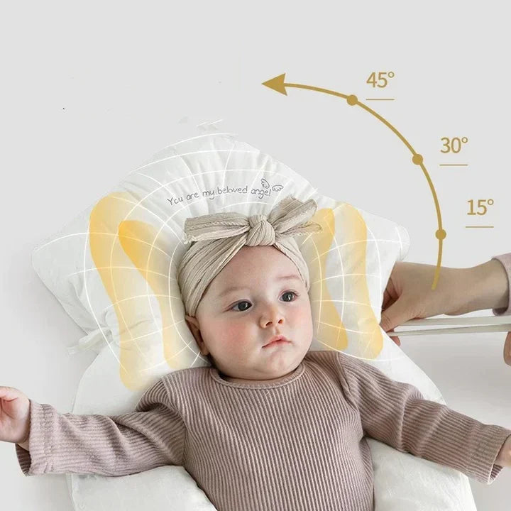 Side view of ergonomic baby sleep cushion, supporting healthy posture & safe sleep. Antibacterial for infant wellbeing.