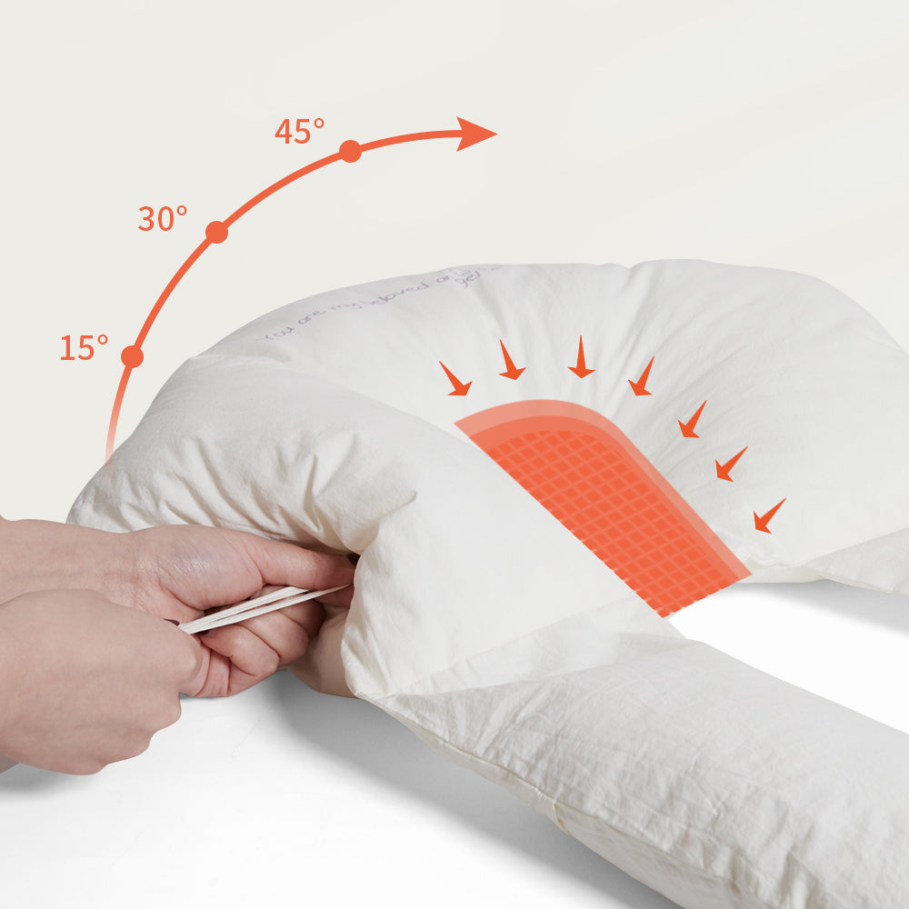 Versatile baby cuddle cushion with antibacterial fabric, providing ergonomic sleep support & comfort for infants.
