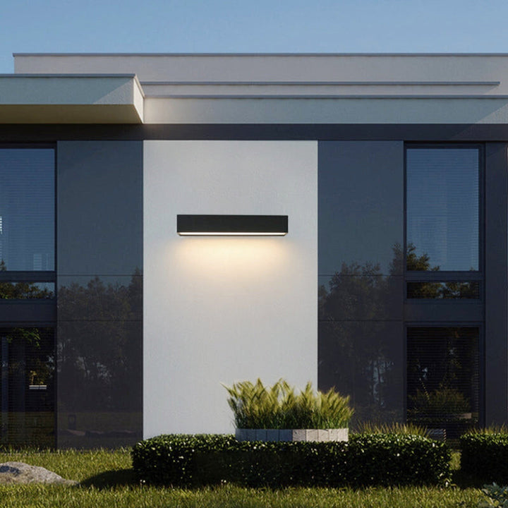 Dusk-to-dawn modern solar outdoor wall light, energy-saving LED for garden, pathway, & facade lighting.