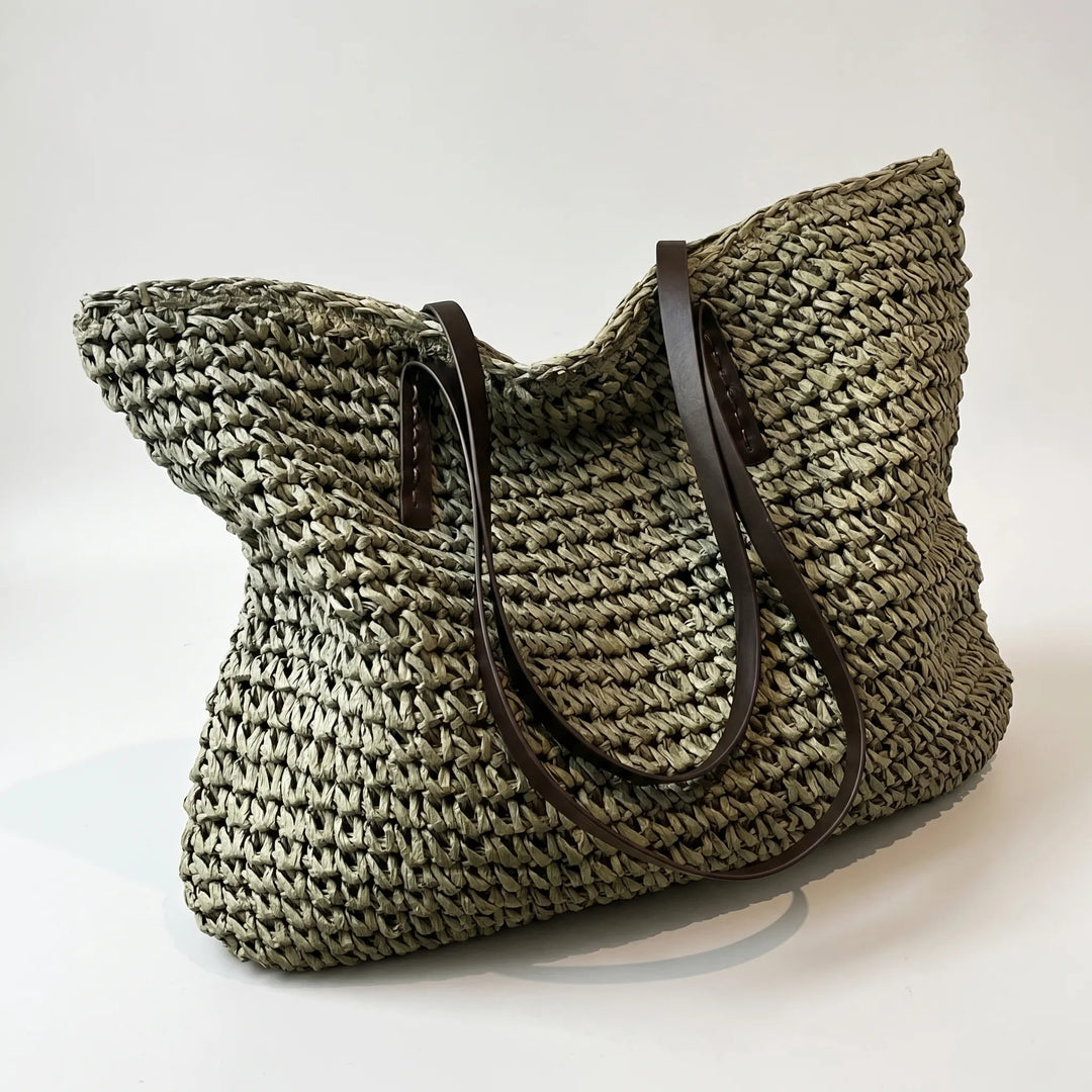 Large capacity woven shoulder bag for women, ideal for beach, travel, and summer adventures.