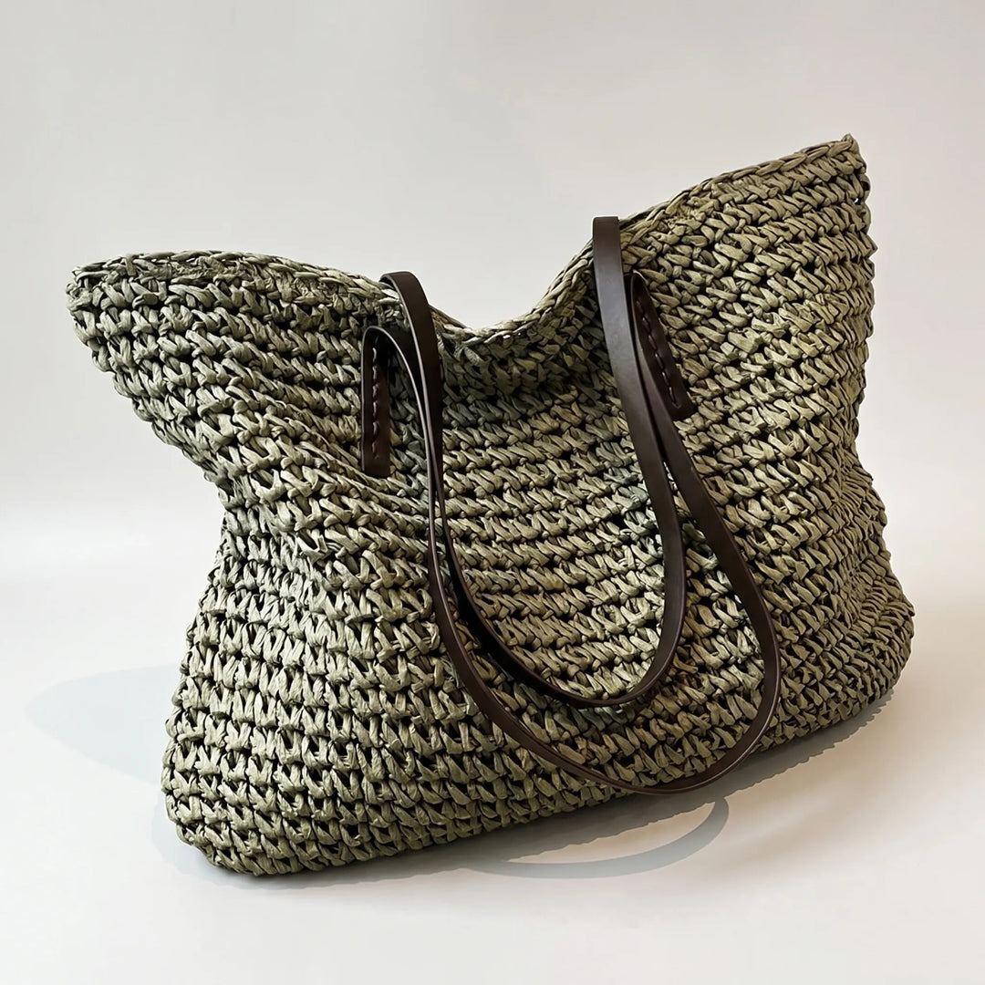 Natural woven summer tote bag for women, spacious & chic beach carryall.