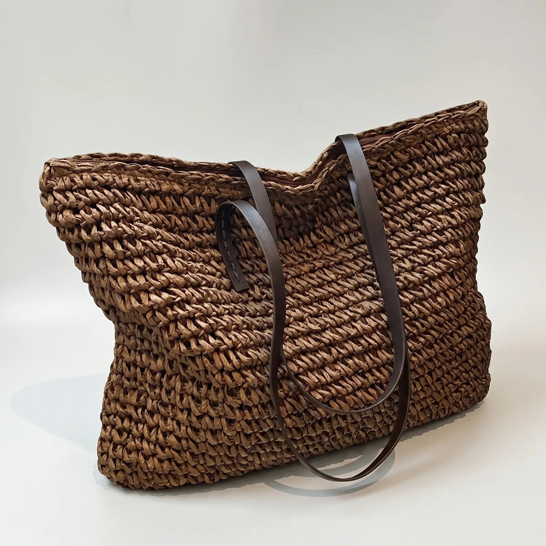 Green woven beach tote bag for women, stylish boho summer carryall with ample space.