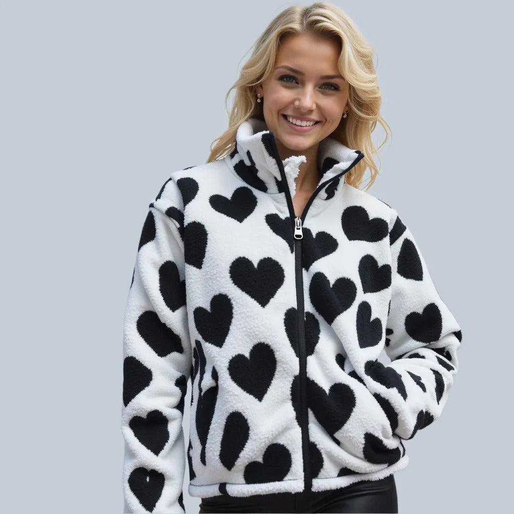 Women's reversible jacket with elegant heart detail. Two stylish looks in one, perfect for spring/fall outerwear.