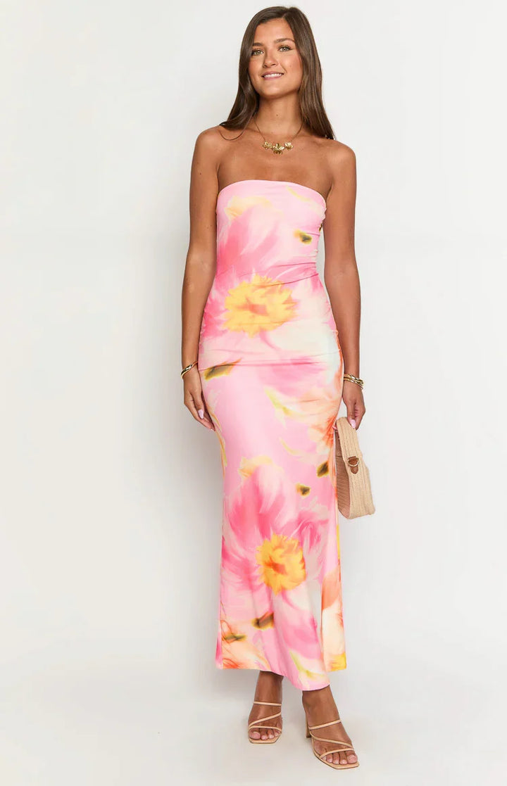 Beautiful women's occasion dress, flowy floral maxi style, elegant for summer.