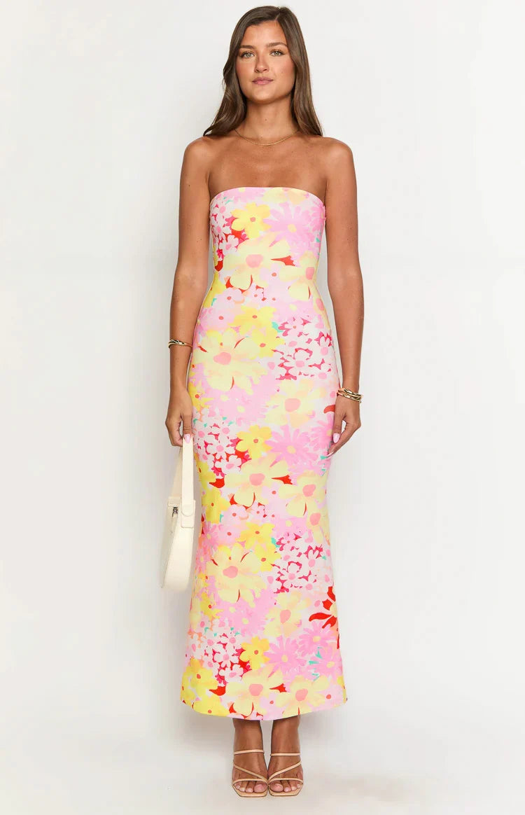 Vibrant floral print maxi dress for women, elegant and flowy, great for vacations.