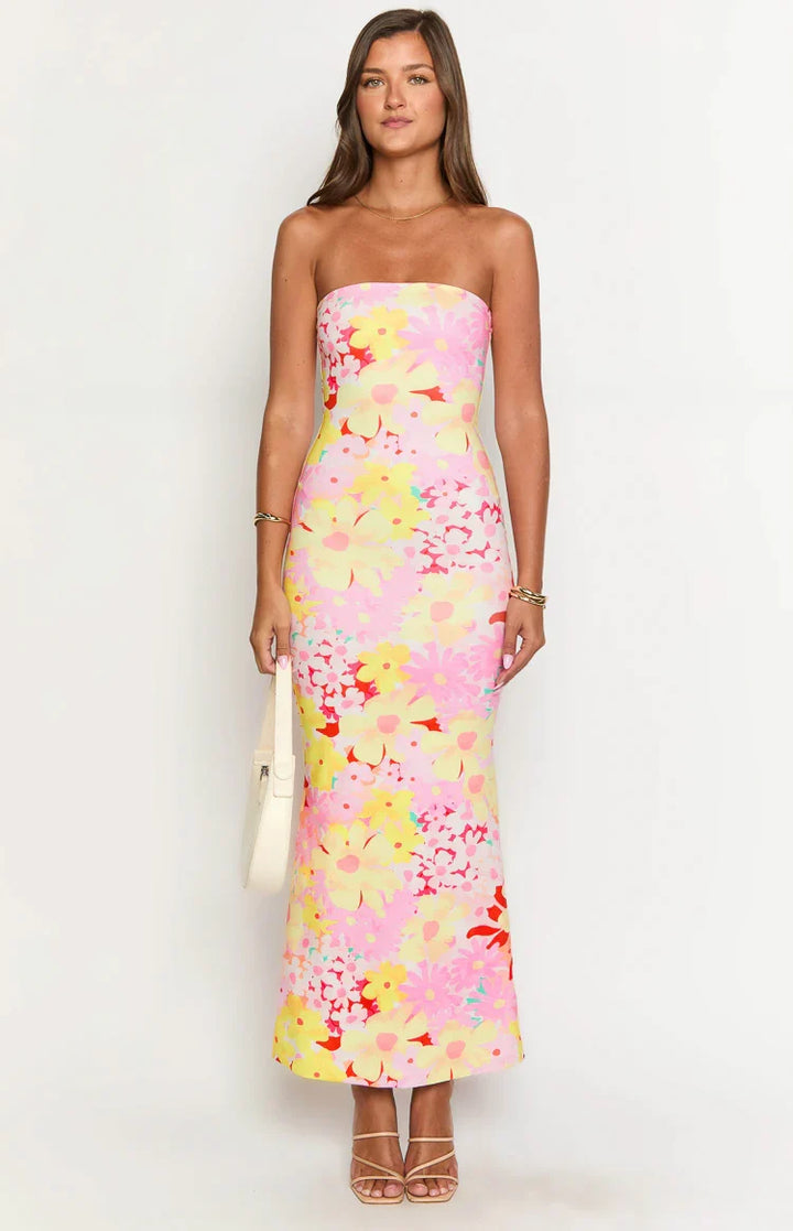 Vibrant floral print maxi dress for women, elegant and flowy, great for vacations.