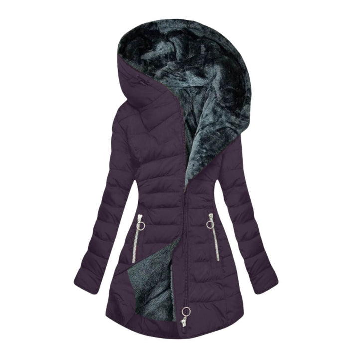 Side profile of a women's stylish waterproof winter jacket, offering sleek design & ultimate cold weather warmth.