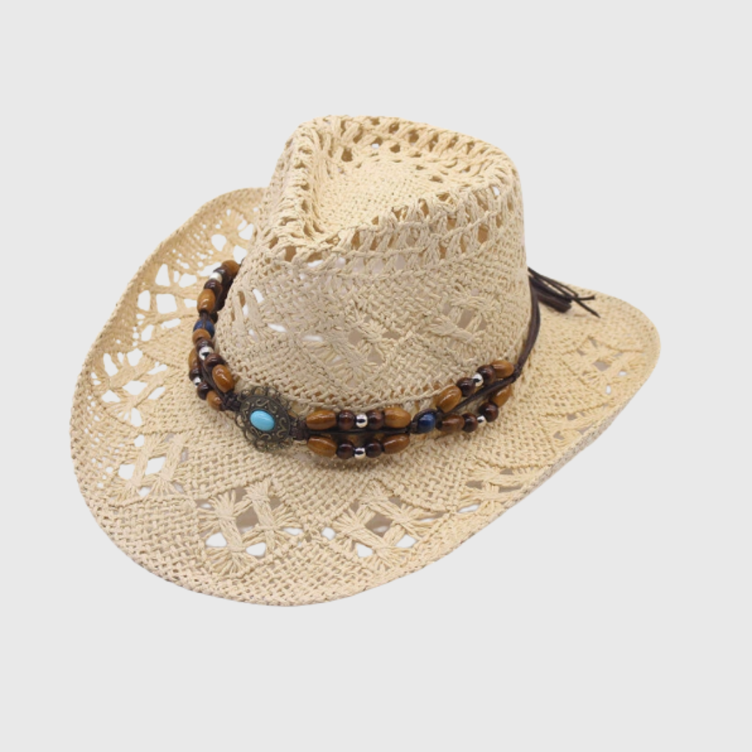 Woven wide-brim women's cowboy hat, ideal for beach, summer, & sun protection. Stylish fashion accessory.
