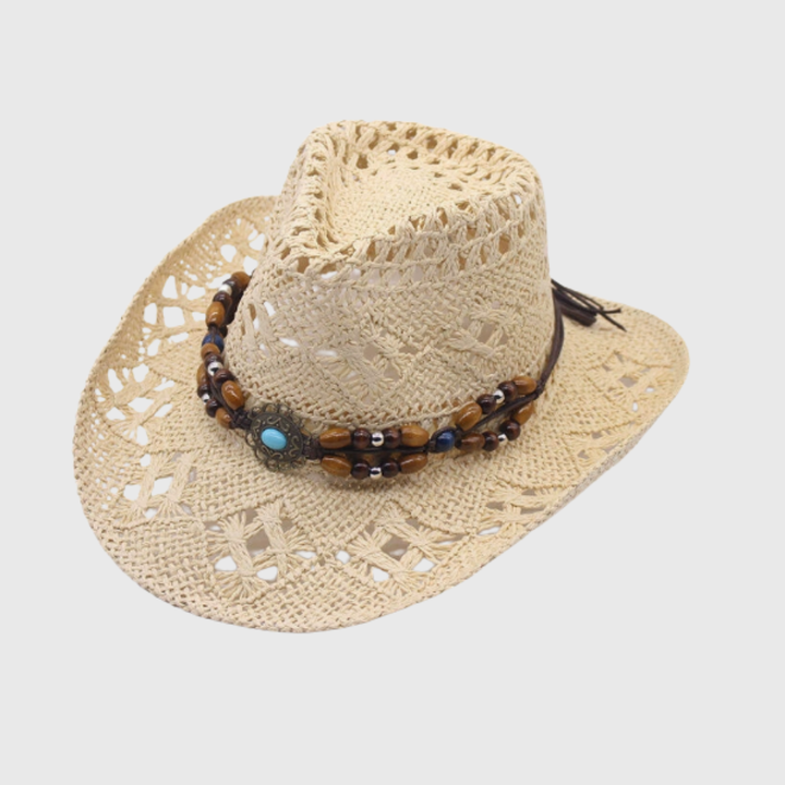 Woven wide-brim women's cowboy hat, ideal for beach, summer, & sun protection. Stylish fashion accessory.