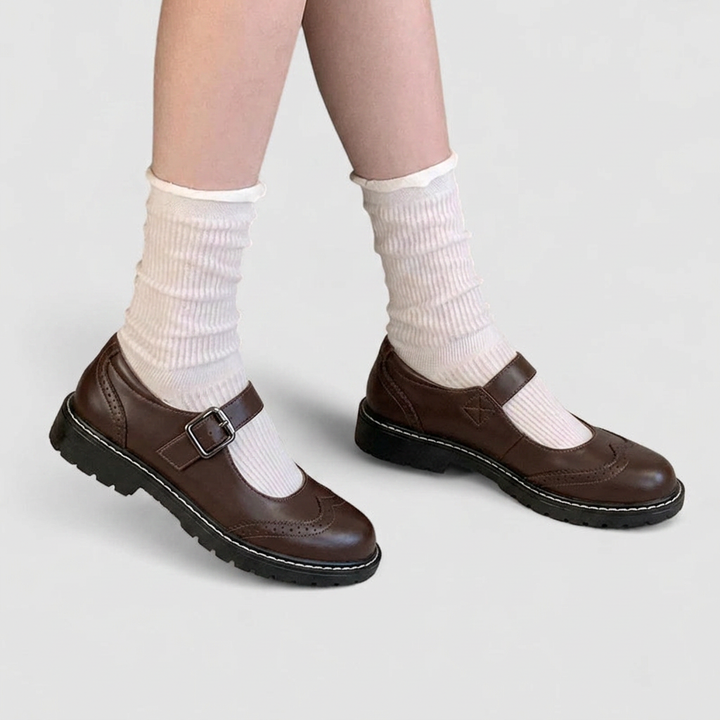 Women's vintage orthopaedic Mary Jane brogue shoes with a chunky sole & adjustable strap, perfect for comfortable walking.