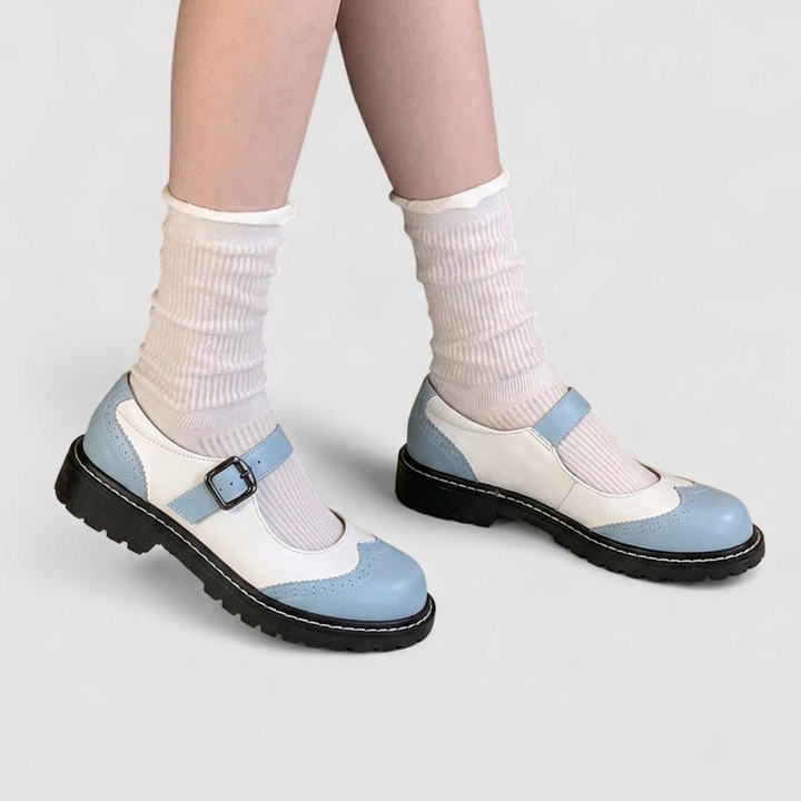 Comfortable orthopaedic women's Mary Jane shoes with brogue details, a chunky flat sole & adjustable strap for walking.