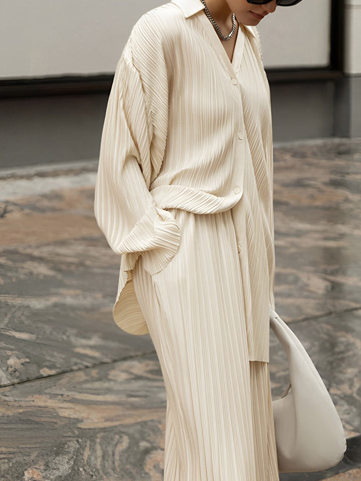 Modern women's wide leg pleated co-ord set, relaxed fit, perfect for casual chic summer outfits.