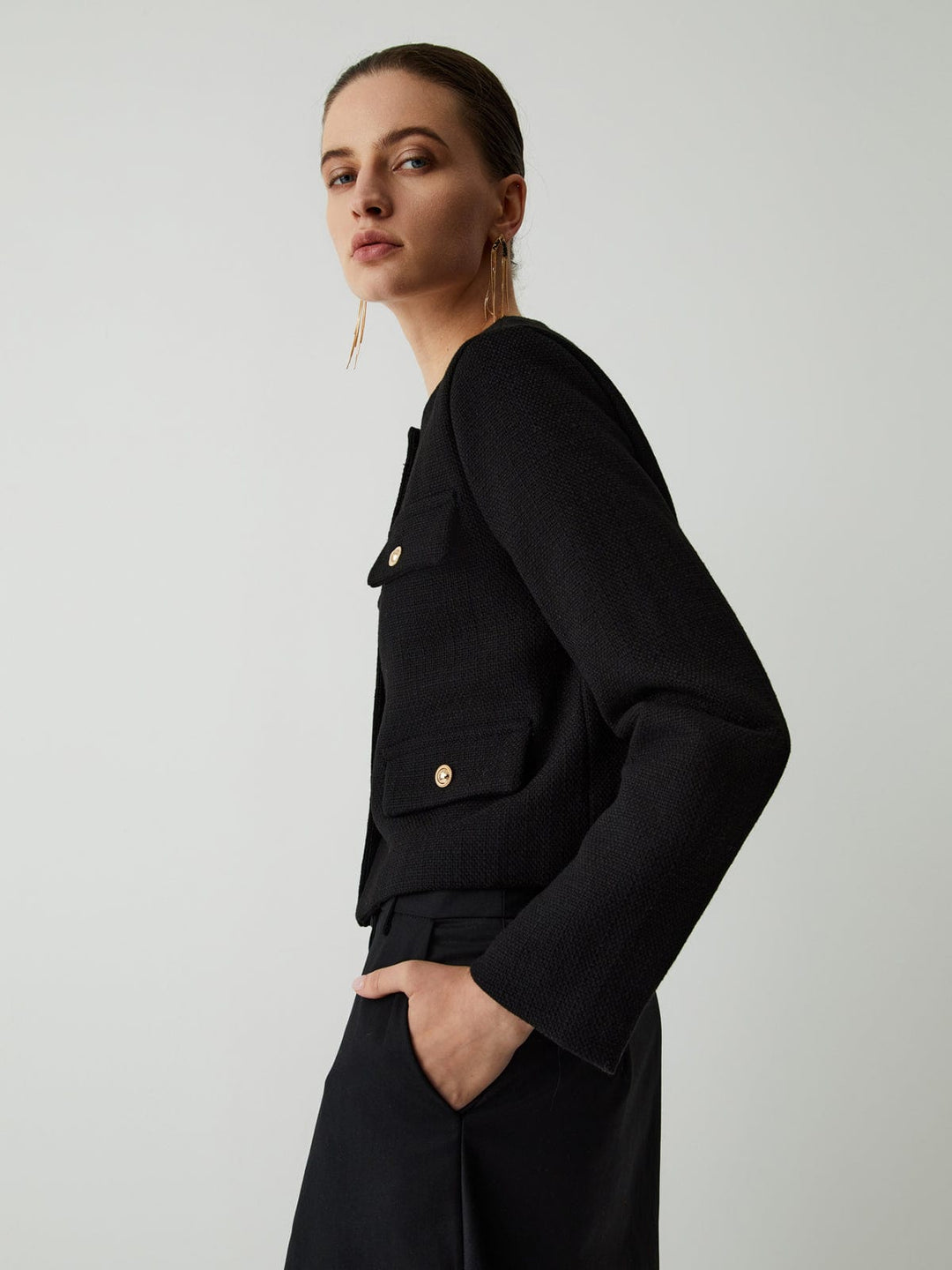 Sophisticated women's cropped jacket with gold buttons & pockets, chic style, workwear, elegant outerwear.