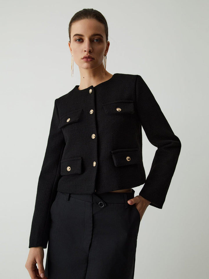 Modern classic women's cropped blazer, gold buttons, tailored, ideal for smart casual or work.