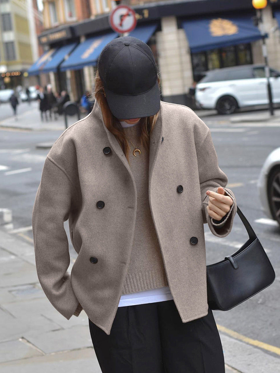Warm women's double-breasted pea coat, perfect winter outerwear. Classic style, elegant design.
