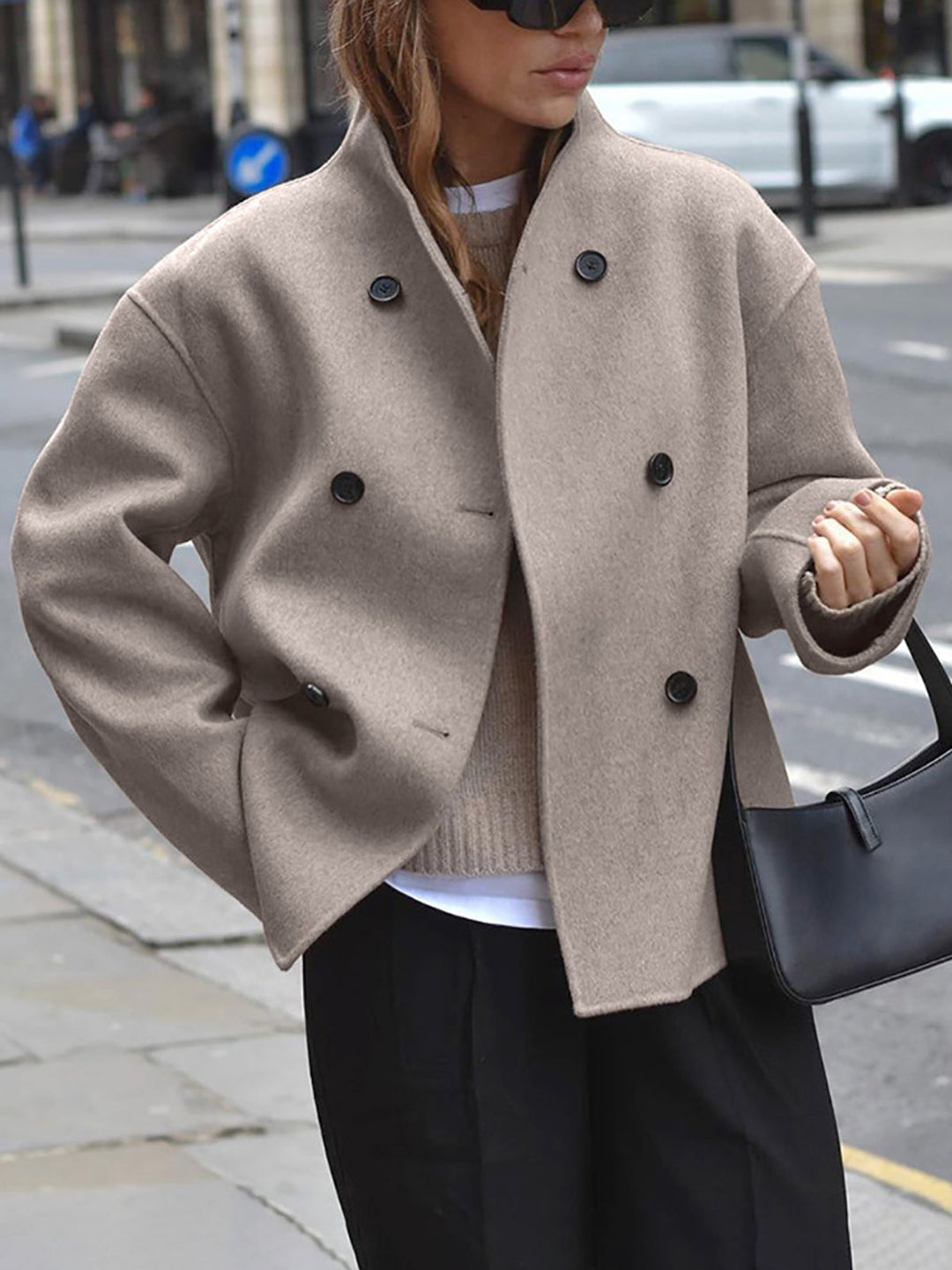 Women's classic double-breasted pea coat for stylish warmth. Winter outerwear with stand collar.