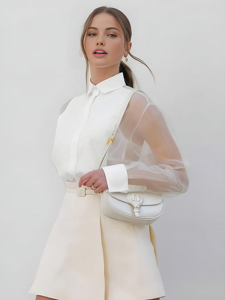 Stylish women's sheer sleeve blouse featuring a collar & button-front, ideal for sophisticated work or evening outfits.