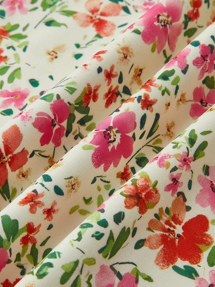 Romantic women's floral midi dress. Elegant spring/summer fashion, perfect for casual or daytime.