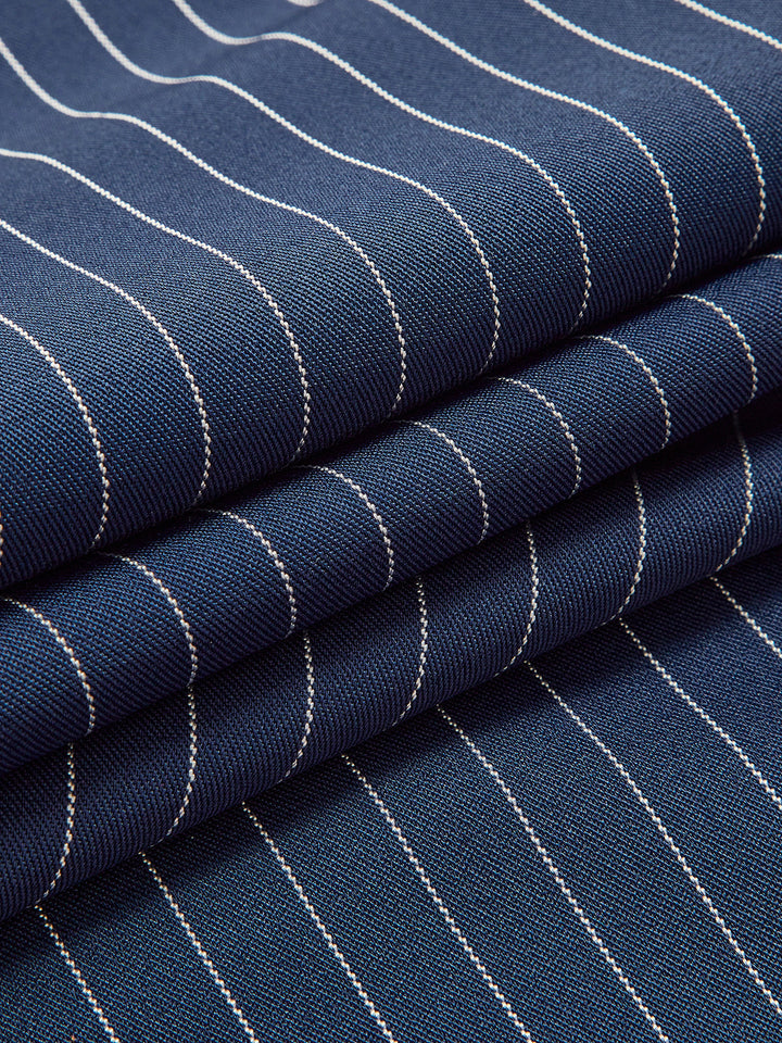 Detailed view of women's high waist wide leg pinstripe trousers, showing fabric and tailored fit.
