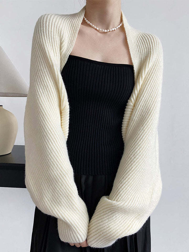 Women's elegant long sleeve bolero cardigan. Effortless chic layering for all-season fashion versatility.