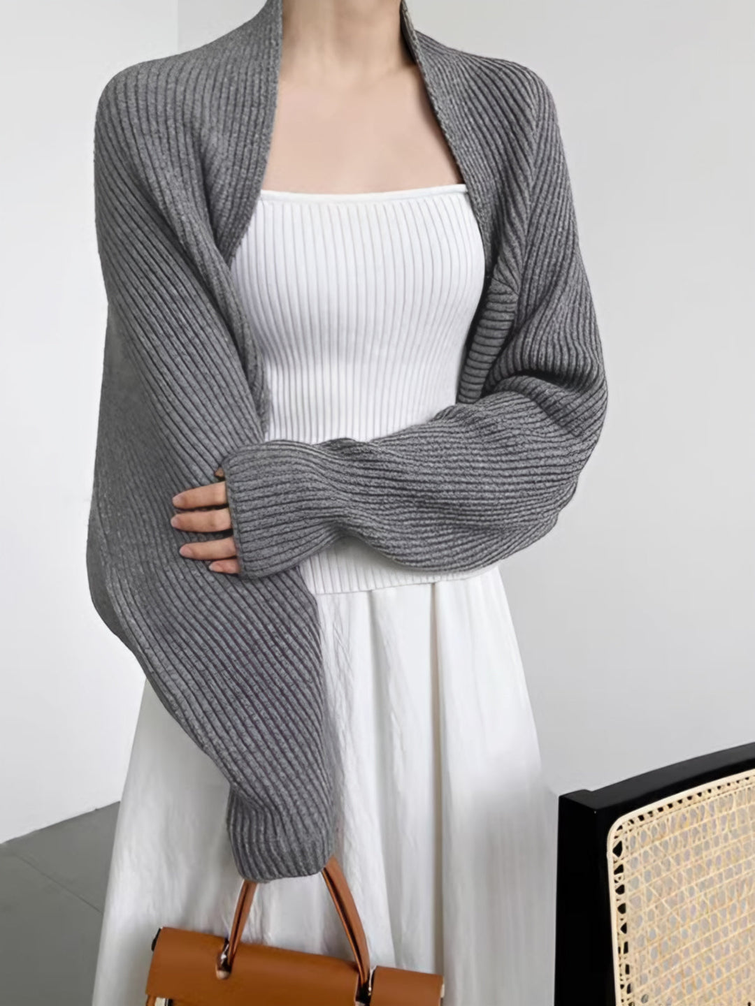 Chic women's bolero cardigan, long sleeve design. Elevate your fashion with this versatile layering piece.