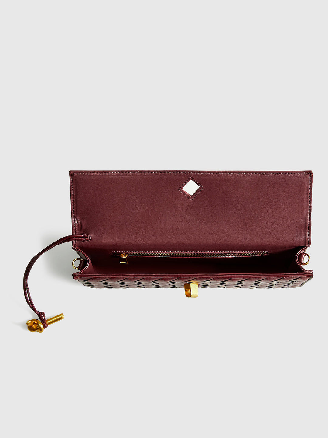 Sophisticated wine red woven flap shoulder bag & clutch. Perfect for women's evening fashion.