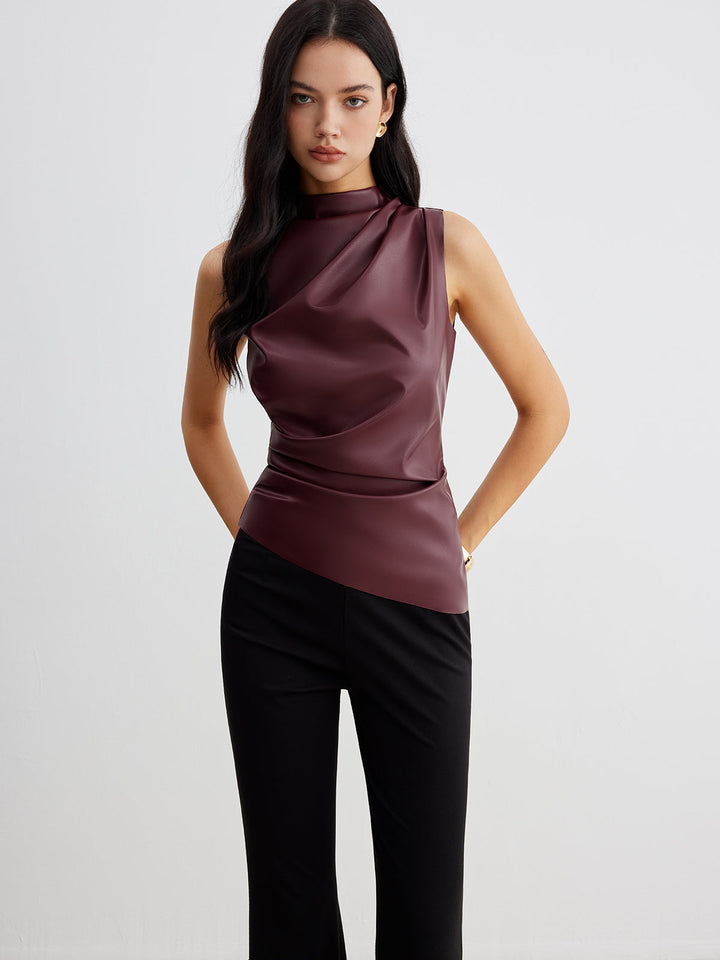 Chic women's high neck sleeveless top with a modern drape, versatile for evening or professional attire.