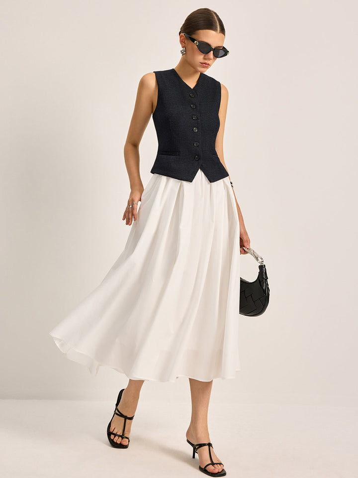 Crisp white A-line pleated skirt, a classic and elegant choice for women's spring and summer fashion.