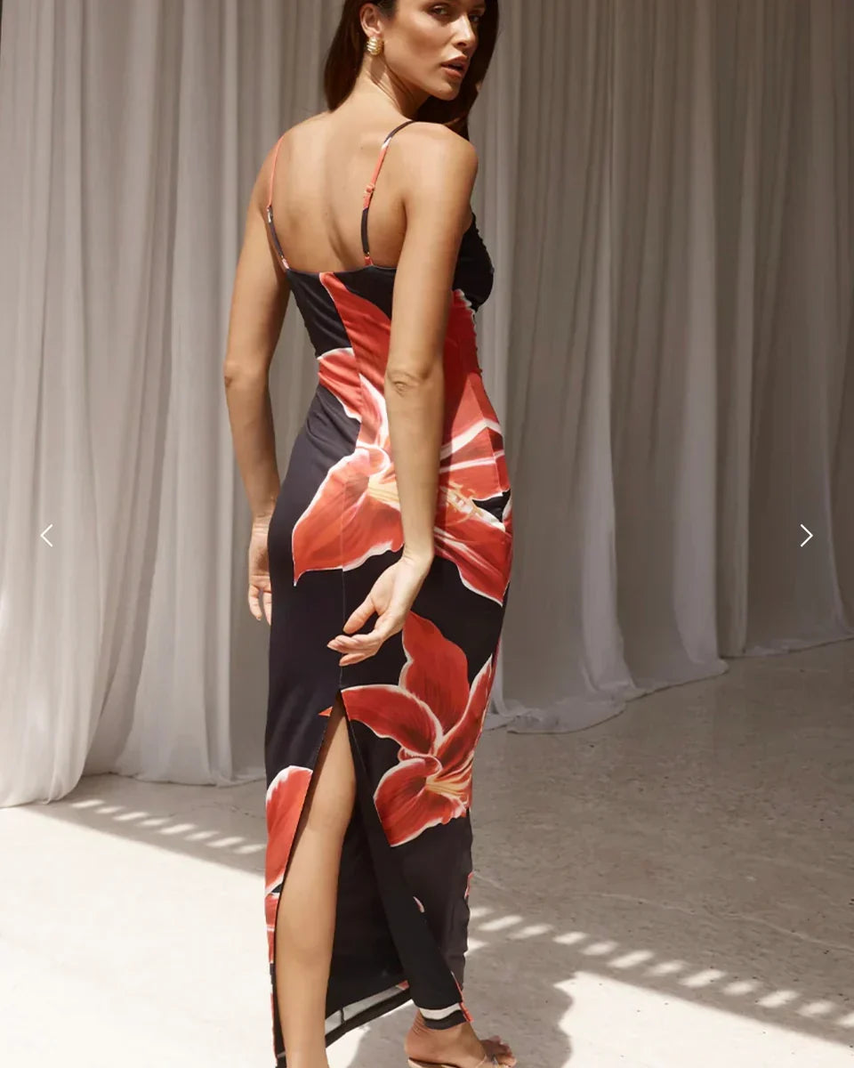 Beautiful floral midi dress for women, an elegant choice for summer occasions. Features adjustable straps.