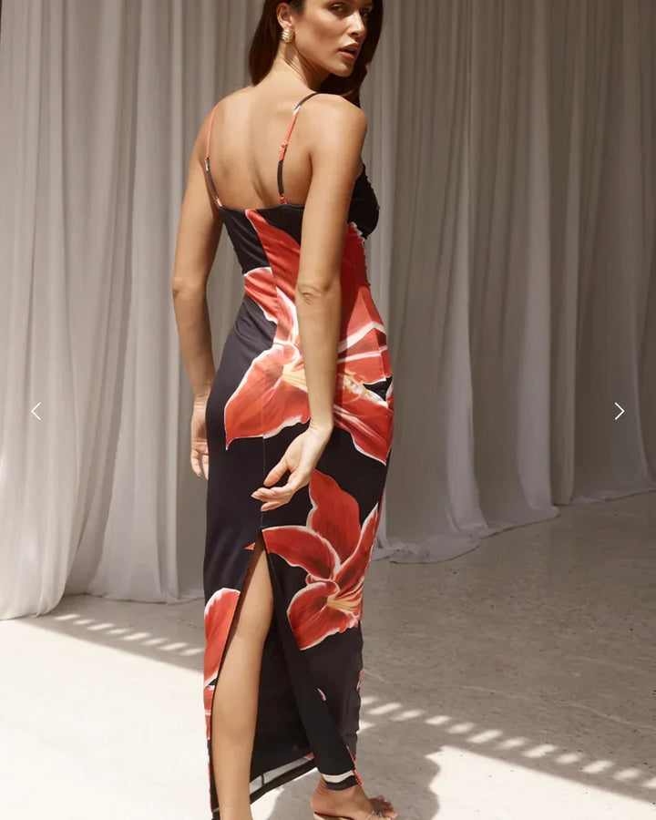 Beautiful floral midi dress for women, an elegant choice for summer occasions. Features adjustable straps.