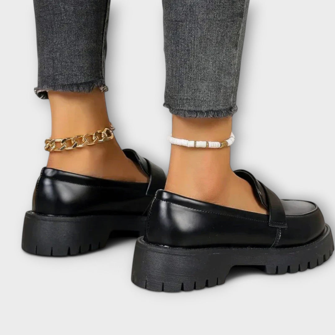 Comfortable women's black loafers. Orthopaedic slip-on flats for easy walking & everyday wear.