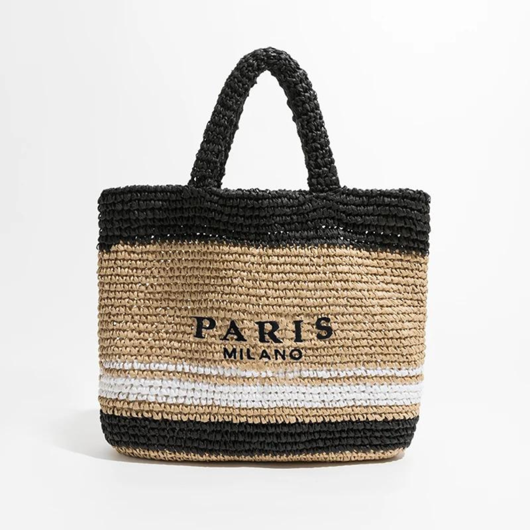 Chic women's crochet straw tote bag with a spacious interior, handwoven for beach, summer, or everyday style.