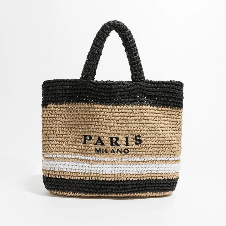 Chic women's crochet straw tote bag with a spacious interior, handwoven for beach, summer, or everyday style.