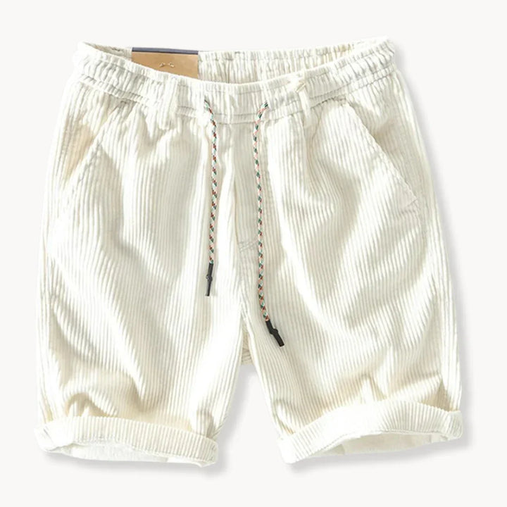 Green men's comfortable summer shorts. Adjustable waist for a relaxed fit, great for travel & everyday casual.