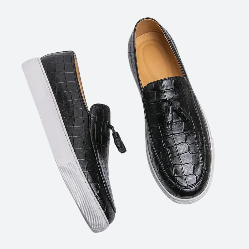 Classic black Italian men's loafers. Elegant slip-on leather footwear for everyday style or dress occasions. Comfortable & sophisticated.
