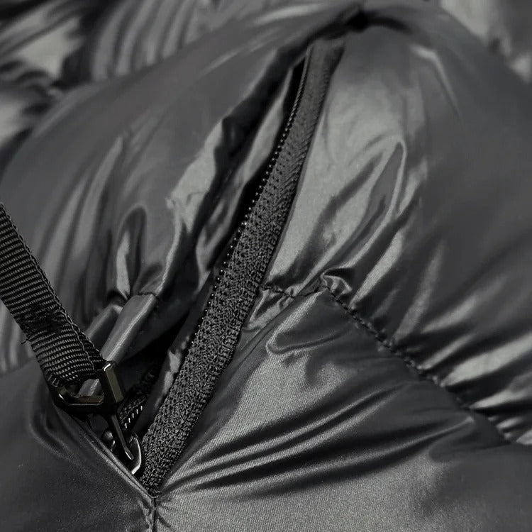 Stylish women's winter outerwear: a sophisticated quilted jacket with hood.