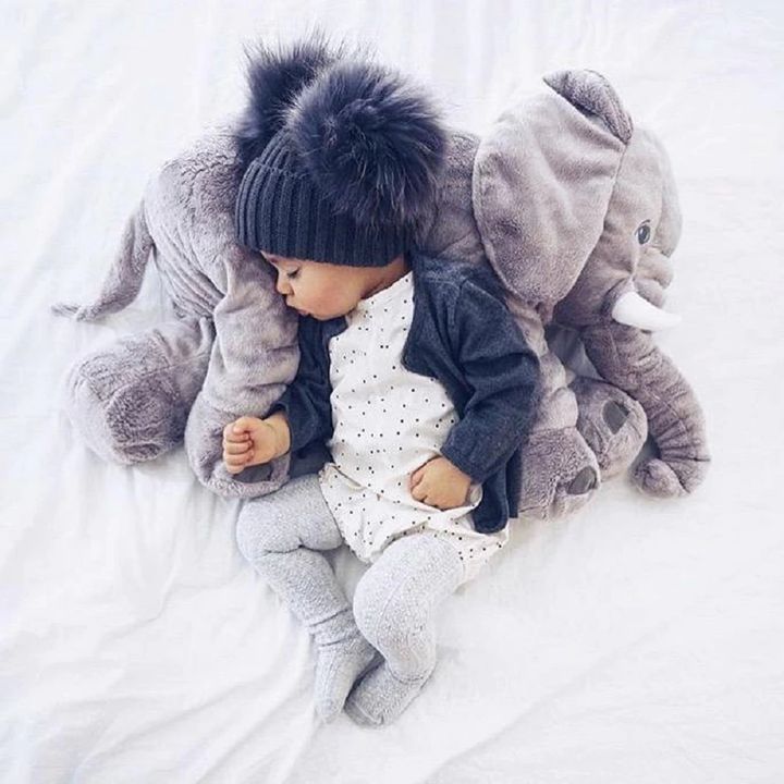 Plush elephant baby pillow, a super soft & safe cuddle toy for newborn comfort & play.