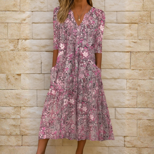 Chic women's V-neck midi flow dress with an elegant, comfortable, and versatile design. Ideal for warm weather.