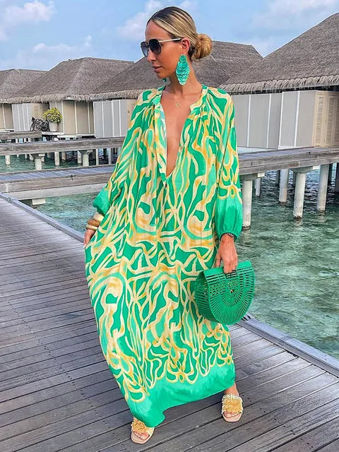 Women's boho print V-neck maxi dress, perfect for summer beachwear or casual elegant style.
