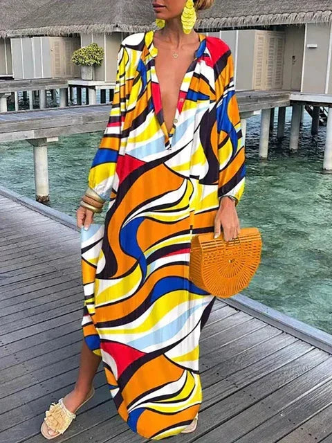Vibrant boho printed maxi dress, women's V-neck summer fashion, perfect for a chic casual or beach look.