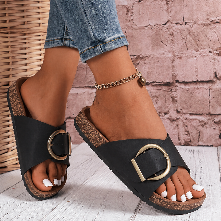 Open-toe casual women's slide sandals with an adjustable oversized buckle for ultimate comfort.