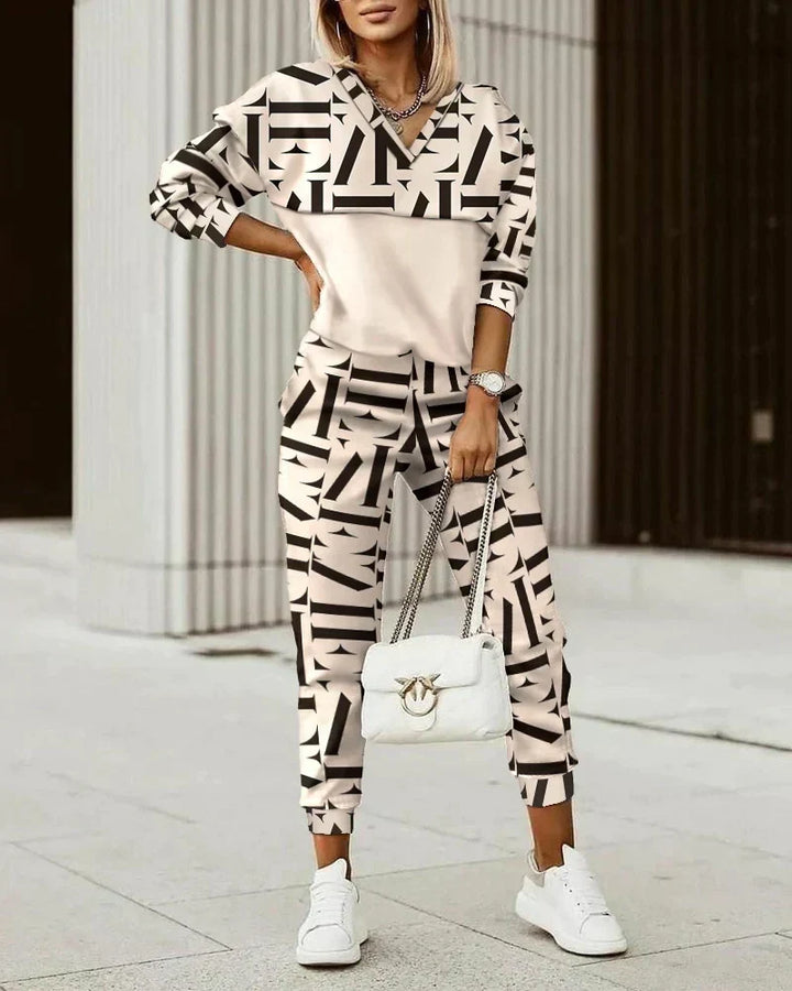 Modern women's stylish comfort tracksuit set, a two-piece outfit perfect for casual or everyday wear.