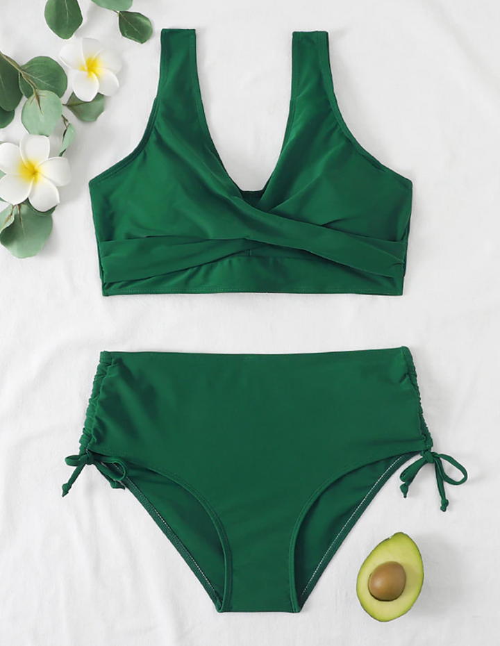Women's stylish two-piece bikini for summer resort wear, ideal beach vacation swimwear. Fashionable design.