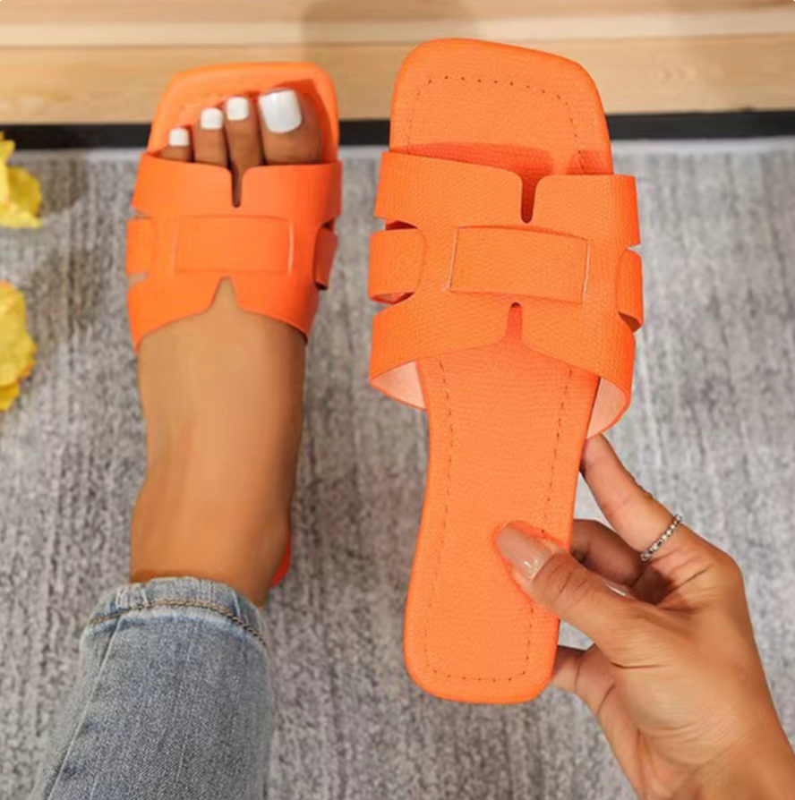 Stylish women's comfort beach flip-flops in a vibrant color, perfect for summer vacations and casual wear.