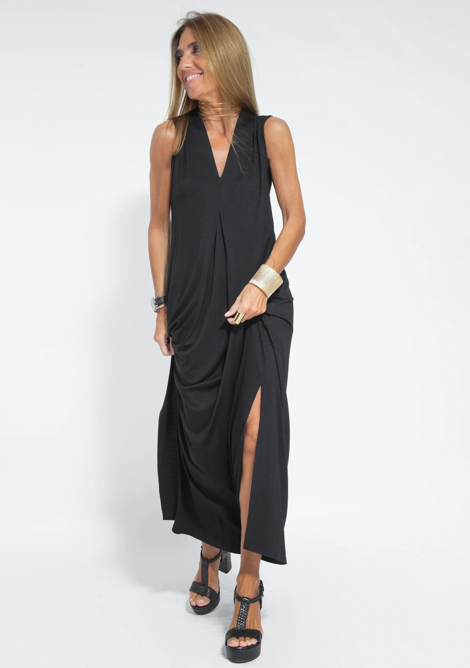 Women's long slimming dress and vest set styled for an elegant formal event, sophisticated fashion.