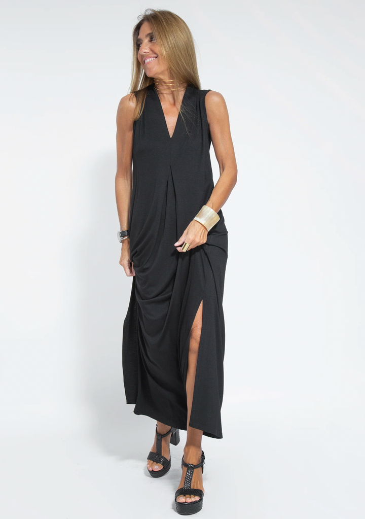 Women's long slimming dress and vest set styled for an elegant formal event, sophisticated fashion.