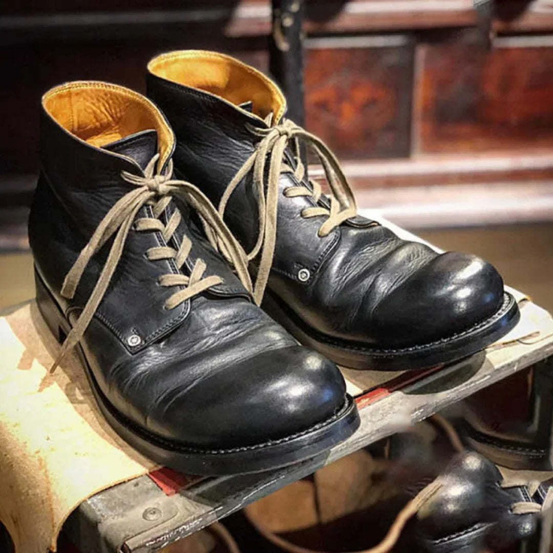 Men's classic black leather boots with durable construction for everyday comfort & timeless style.